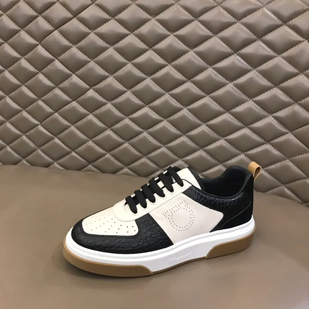 p440 "Salvatore Ferraga**" men's low-top fashion sneakers. This casual shoe has a novel structure and is made of soft calfskin. The contrasting color elements on the upper highlight the bold and avant-garde atmosphere. The first-layer cowhide lining is high-end and comfortable. Energetic and fresh, these shoes can be worn with casual looks or add a touch of street style to elegant trousers.  Size: 38-44